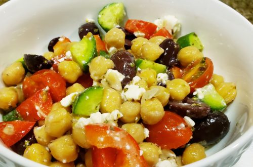 Garbanzo been salad with fresh veggies and Feta cheese.